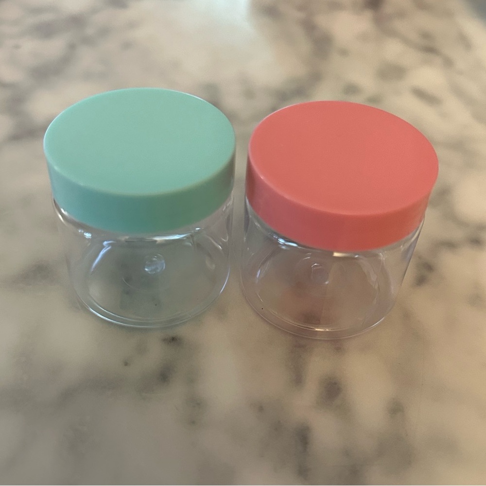 TWO SMALL TRAVEL CONTAINERS